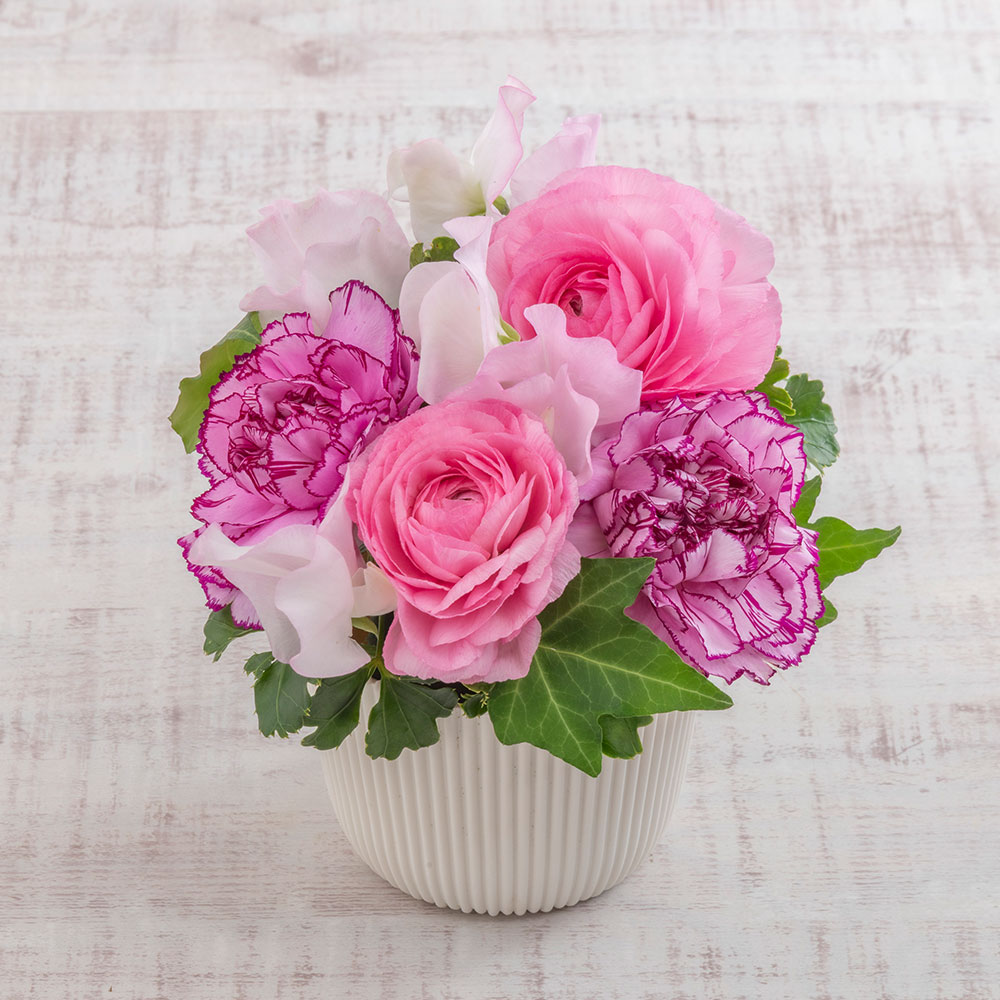 ゴディバ「アリスのティーパーティ アソートメント」とアレンジメントのセット