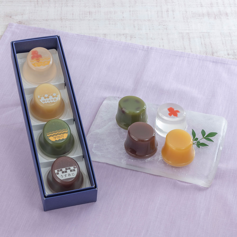 【お供え用】 俵屋吉富「伝統の涼菓4個入」とプリザーブドフラワーアレンジメントのセット