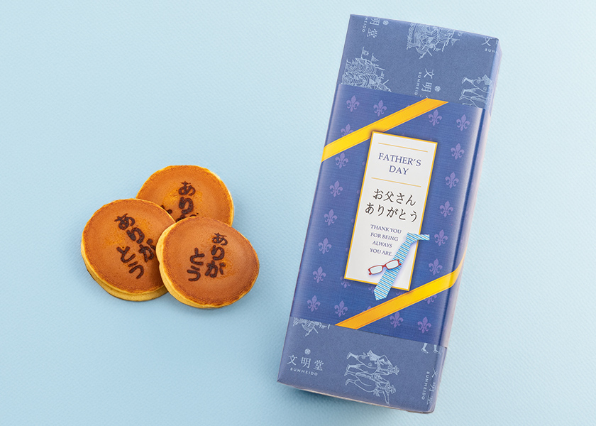 文明堂「ありがとうの焼き印入り月三笠」とお花のセット